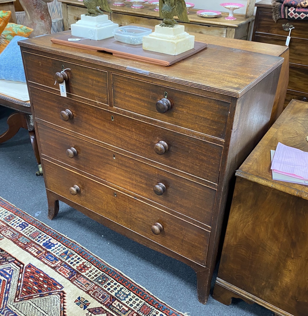 A Regency mahogany chest of two short and three long drawers, width 106cm, depth 50cm, height 106cm
